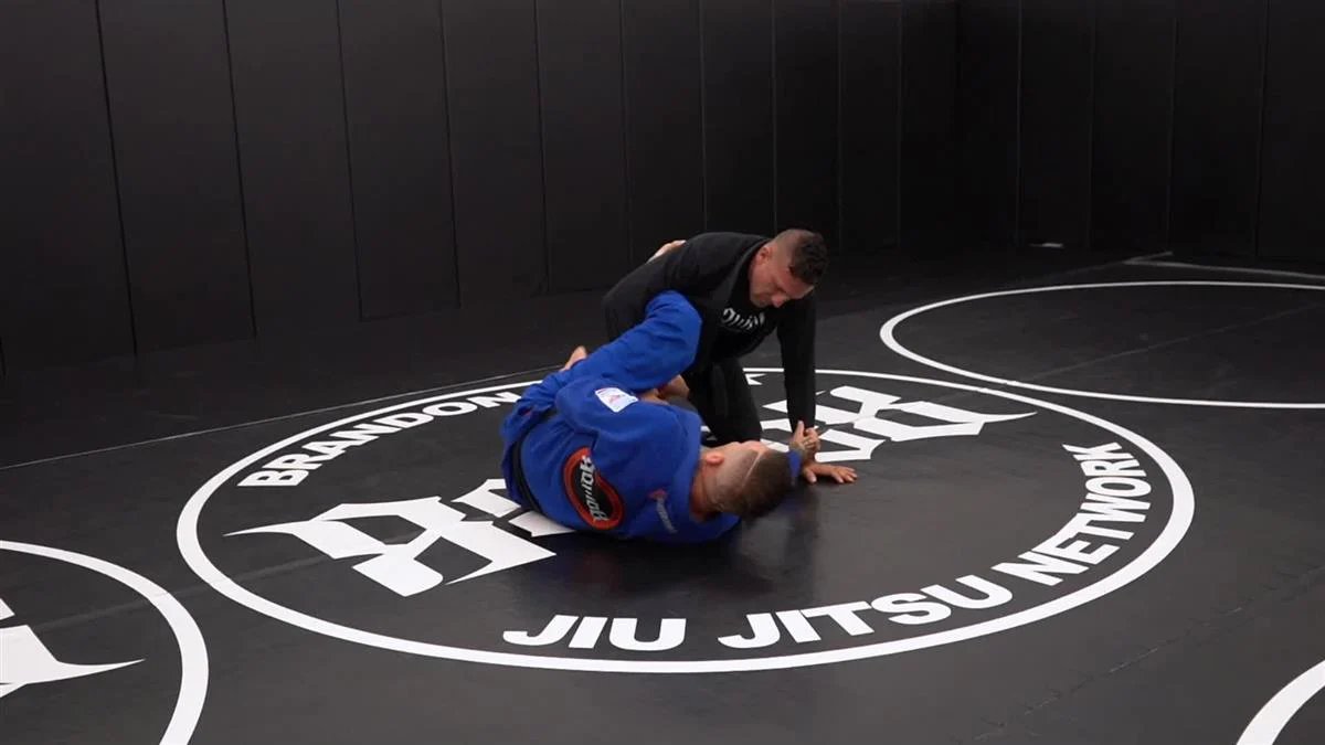 Advanced Half Guard: Tilt Sweep by Brandon Quick - Image 5