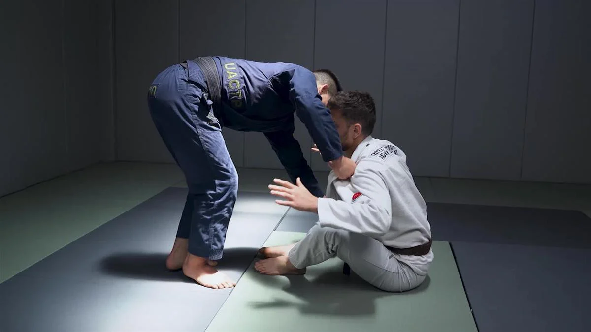 Footwork Passing vs The seated Guard by Isaac Doederlein - Image 5